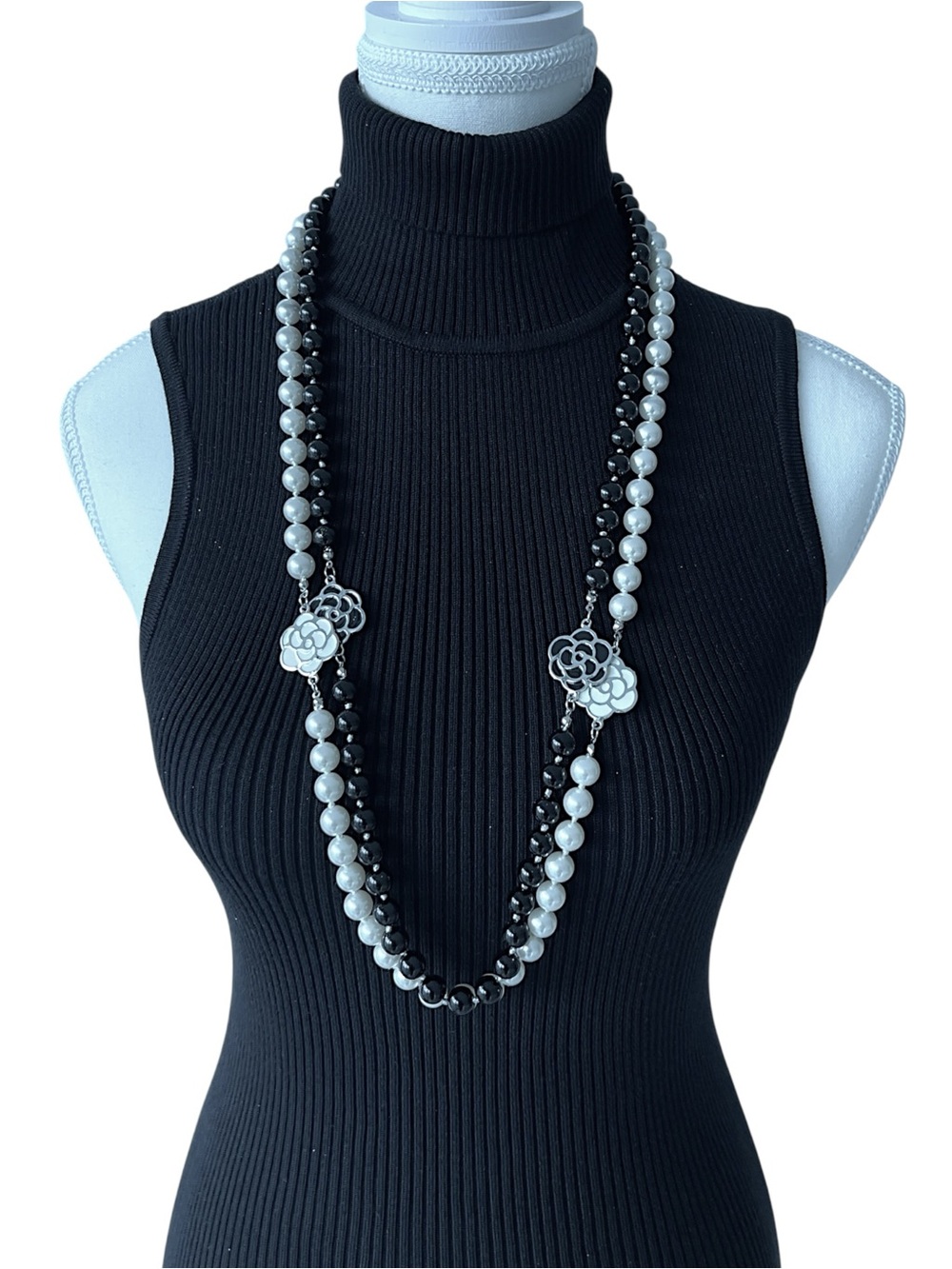 Long Two-Tone Black and White Beaded Necklace with Floral Accents
